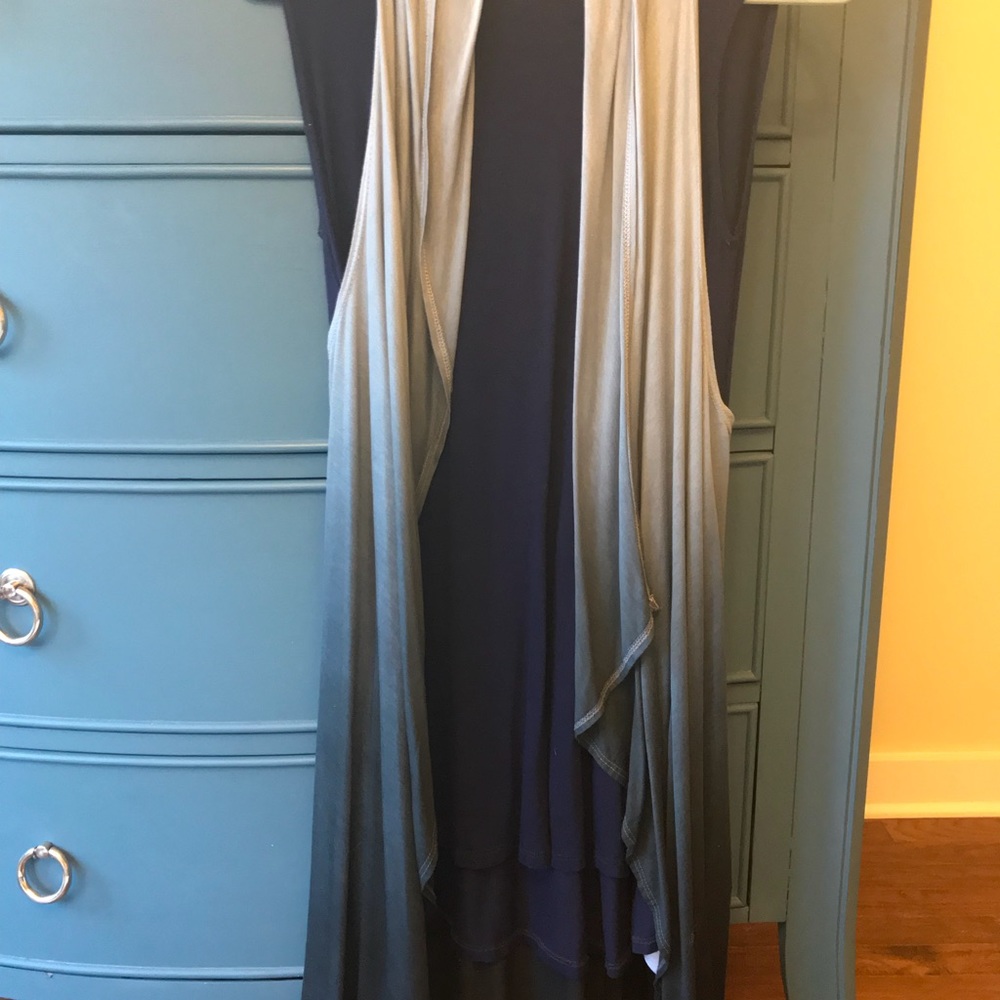 Dress with sleeveless wrap.